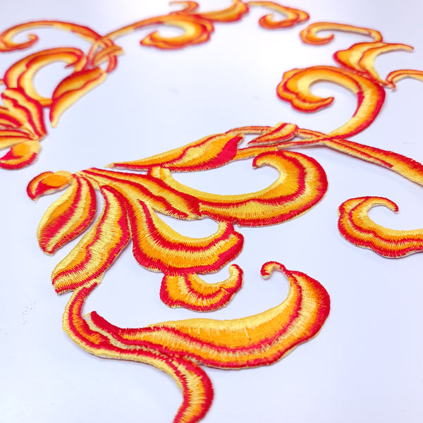 Mirrored pair iron on embroidered appliques orange