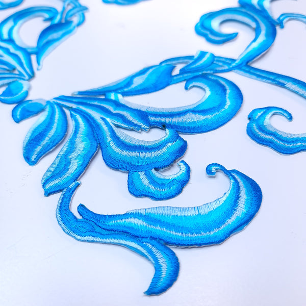Mirrored pair iron on embroidered appliques blue
