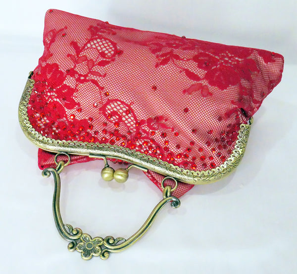 Red lace handbag with bow and antique brass handle, handmade by Rockstars and Royalty