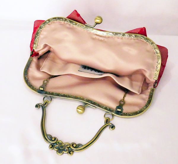 Red lace handbag with bow and antique brass handle, handmade by Rockstars and Royalty