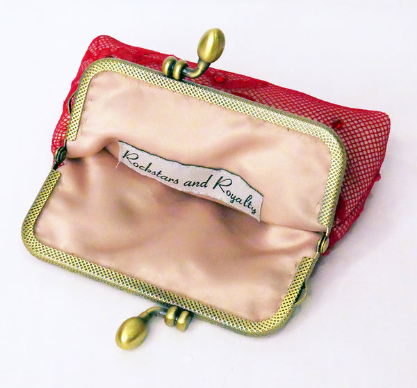 Red lace coin purse with brass frame and red crystals