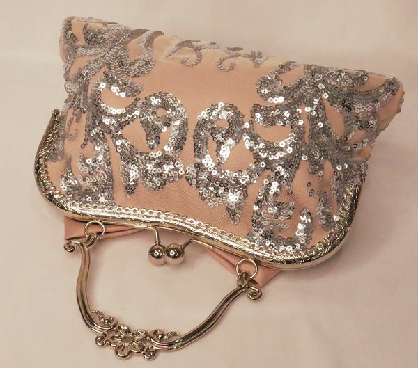 Blush pink satin and silver sequin lace handbag with a bow, silver frame and handle