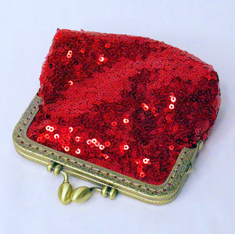 Small red sequin coin purse with brass frame