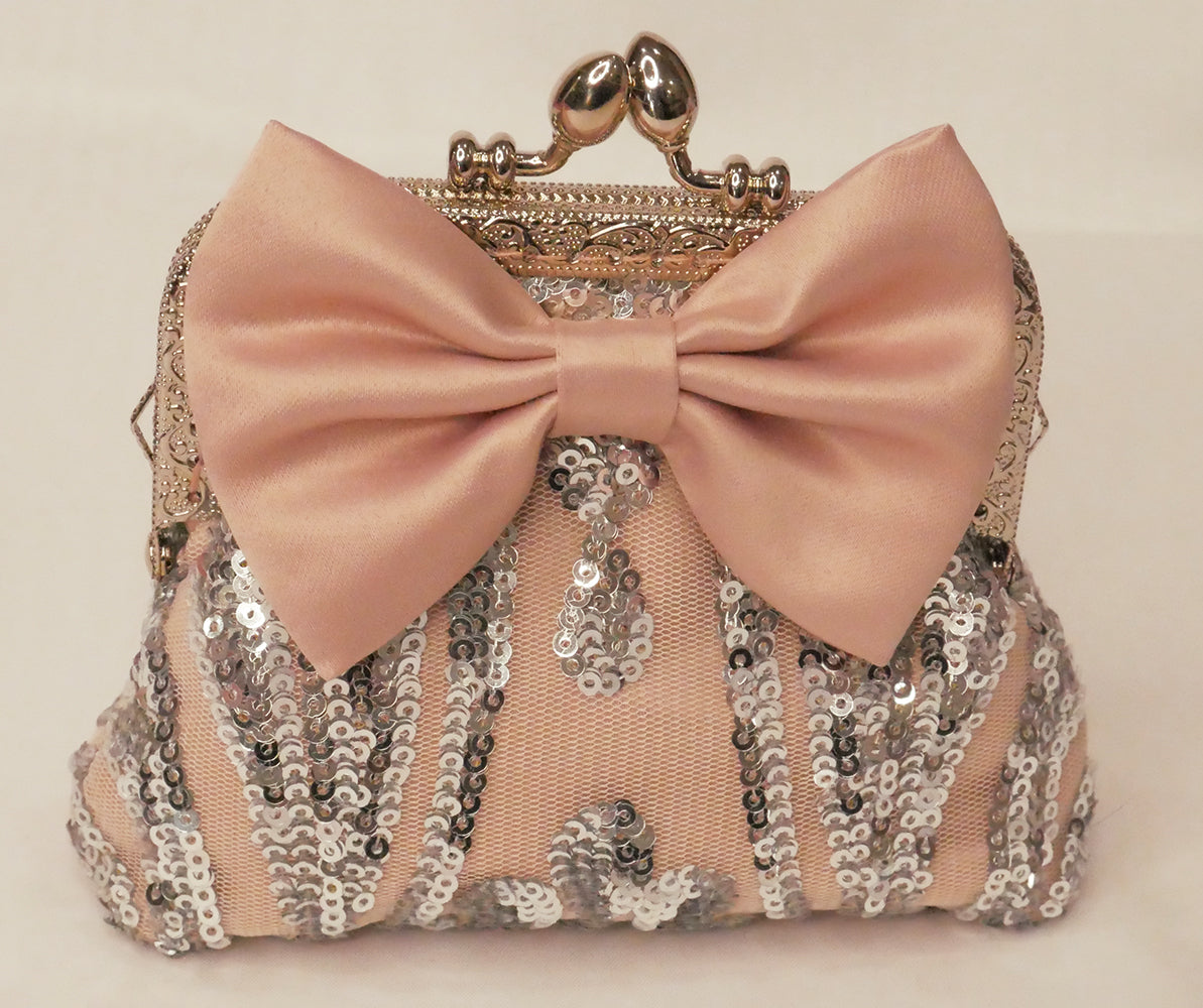 silver sequin and blush pink satin small purse with blush satin bow and silver frame