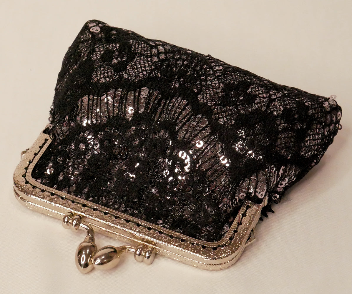 silver sequin small purse with black lace overlay and silver frame